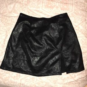 black mini skirt never worn